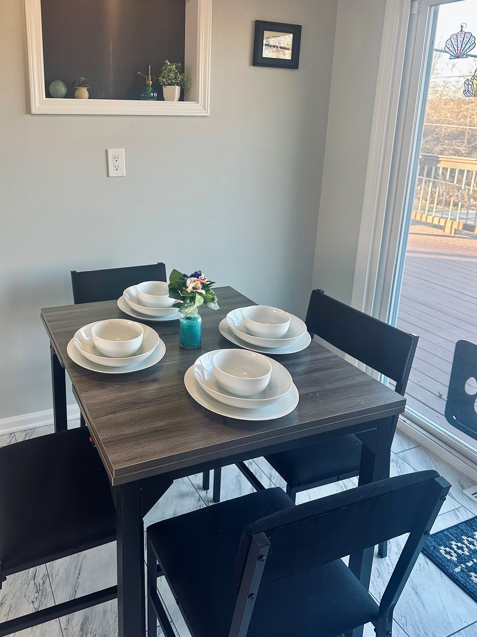 This expanding dining table set for everyday, space-saving, use in it’s compact form, seating four with full place settings.