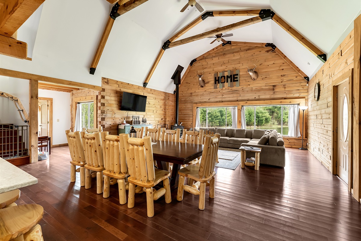 Large table in living room area for eating or playing games. 