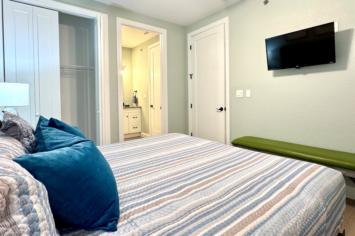 Guest King Bedroom 2 with TV and en suite bathroom