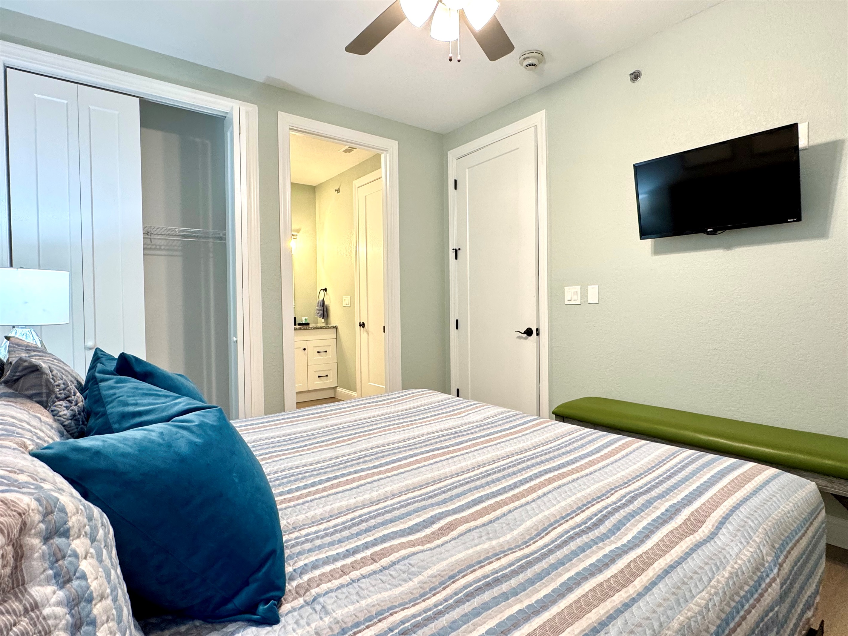 Guest King Bedroom 2 with TV and en suite bathroom