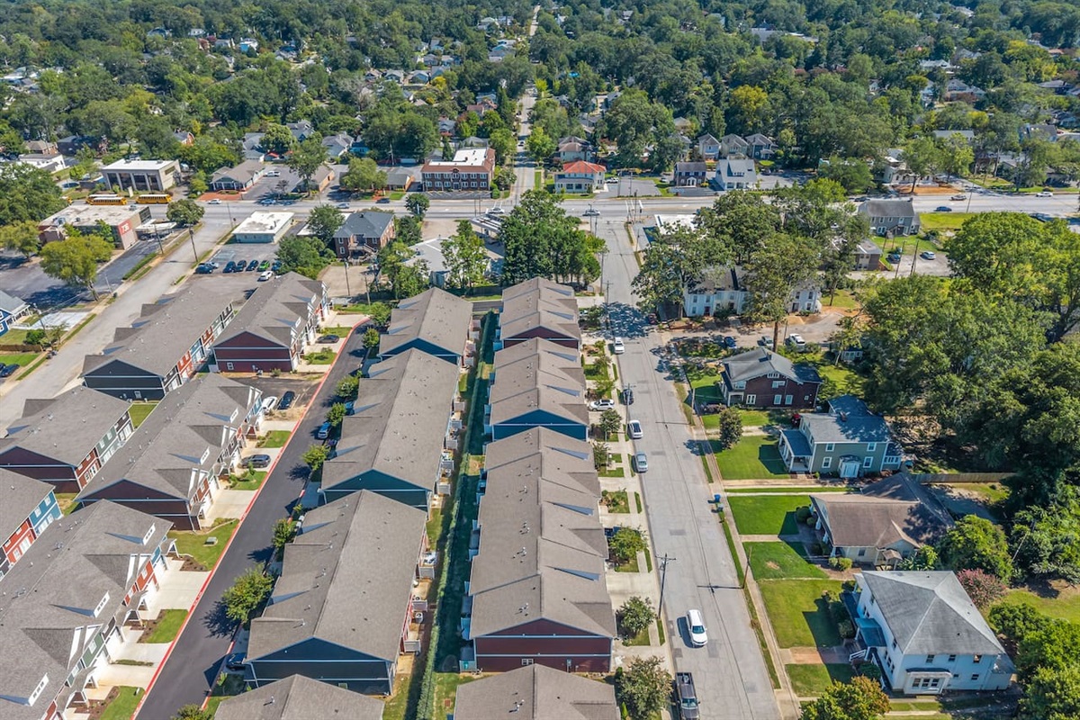 A stunning bird’s-eye perspective showcasing the modern townhome community.