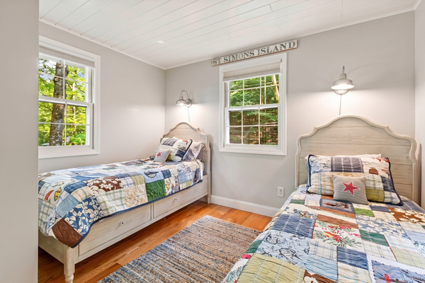 3rd Bedroom with two twin beds and a projector for movie nights!