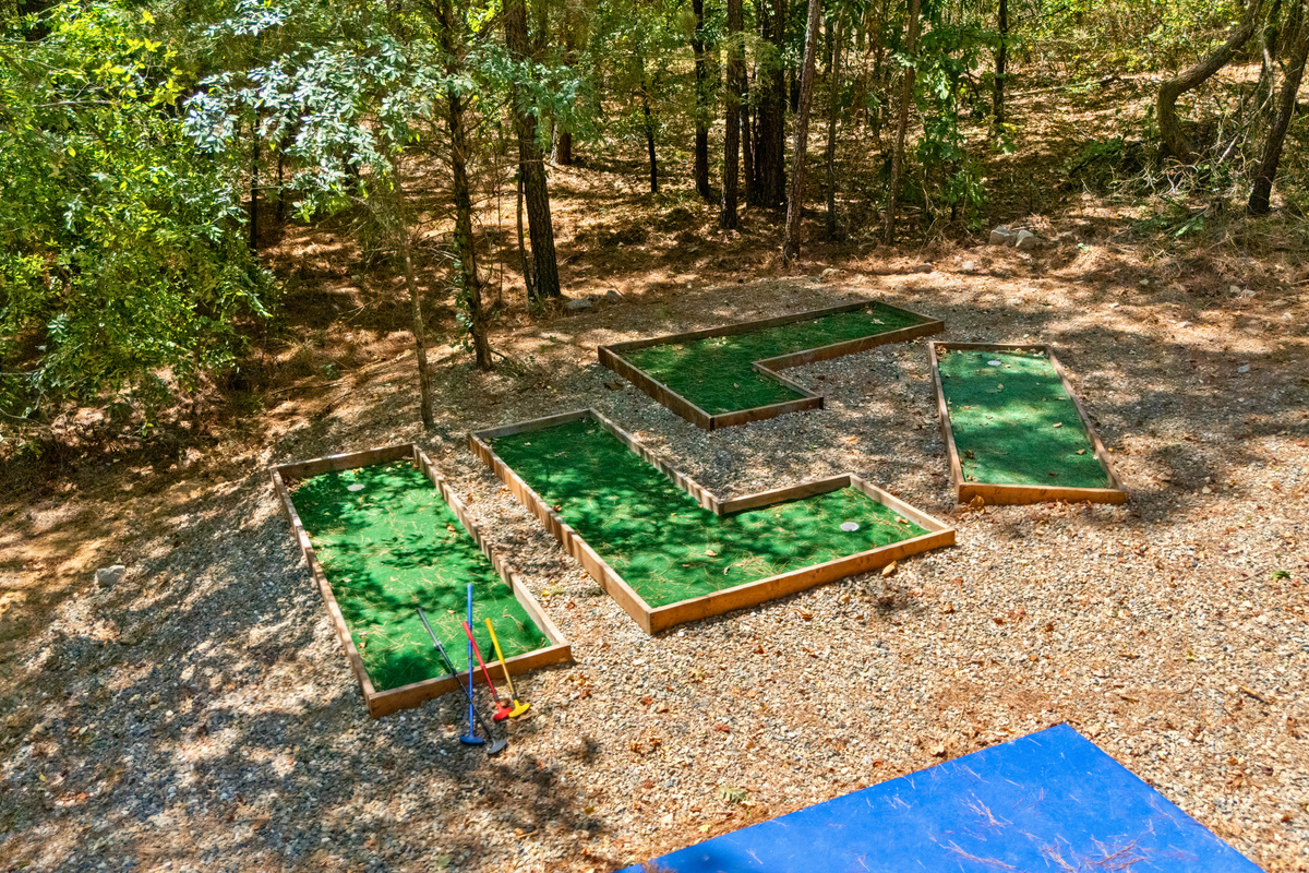 Practice your putting on the outdoor putt putt course, tucked beneath the trees for a fun and easygoing activity the whole group can enjoy.