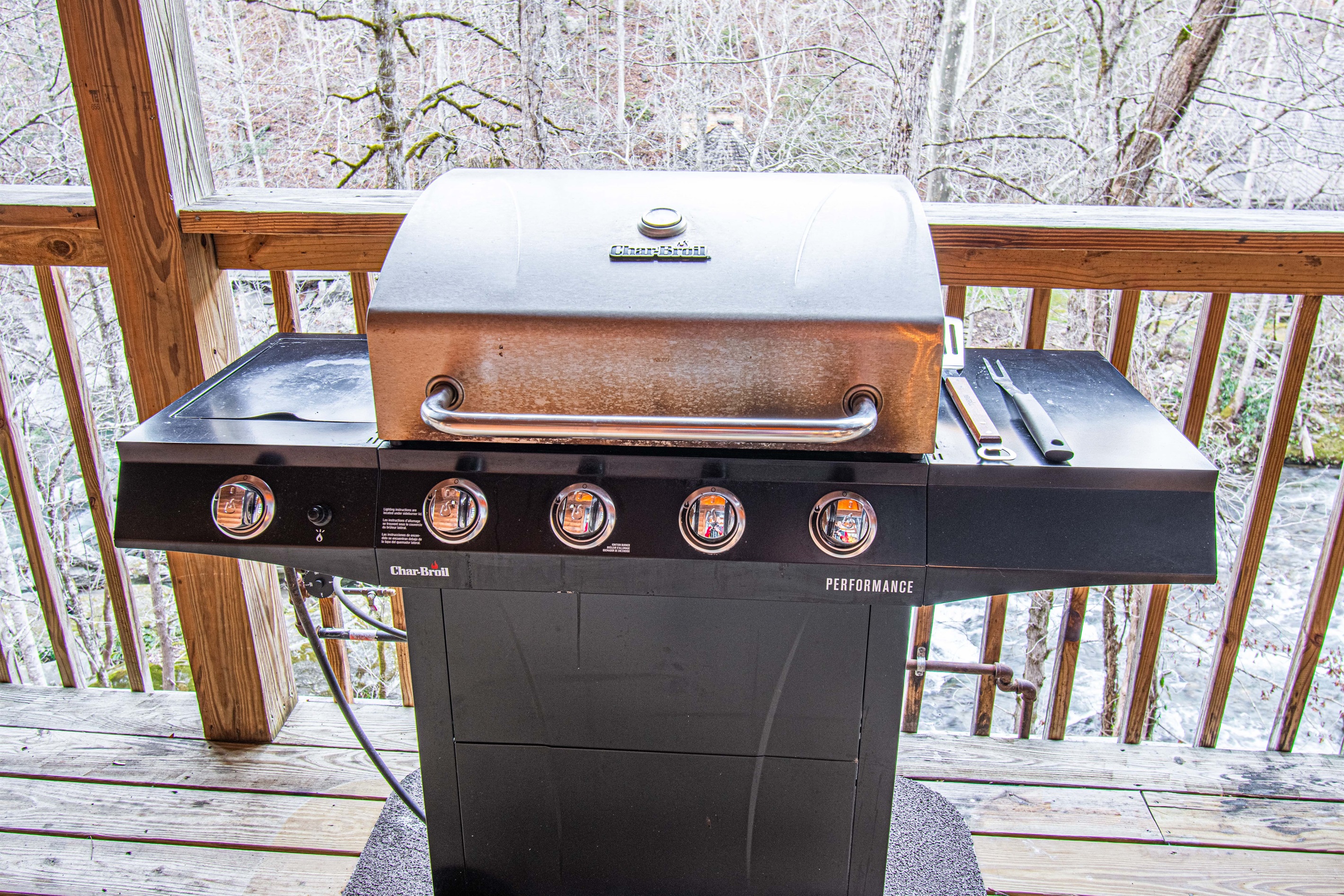 No charcoal required - gas grill runs on propane timer.