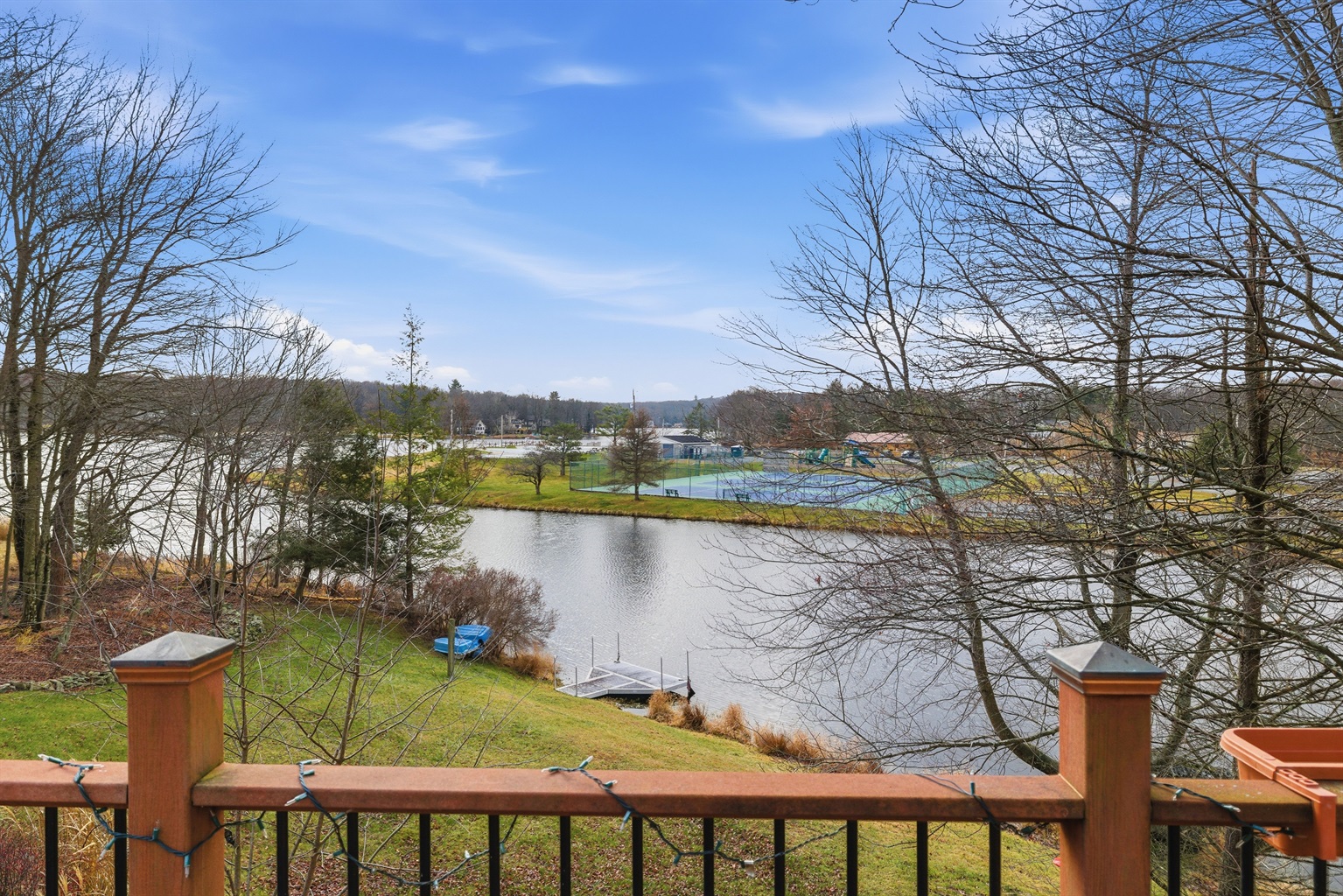 Deck overlooking the lake and Island complex.  Deck has BBQ grill and outdoor seating.
