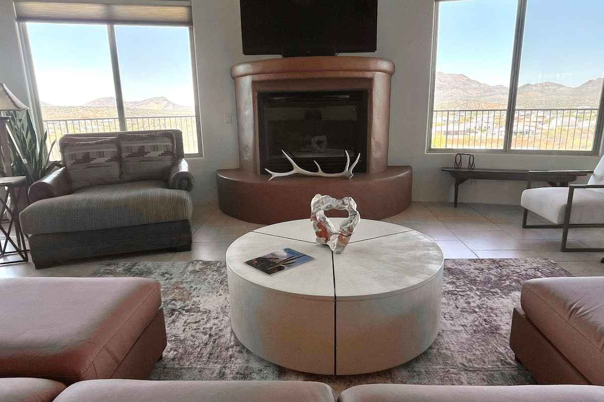 Multiple seating areas make this living room easy for everyone to settle in comfortably.