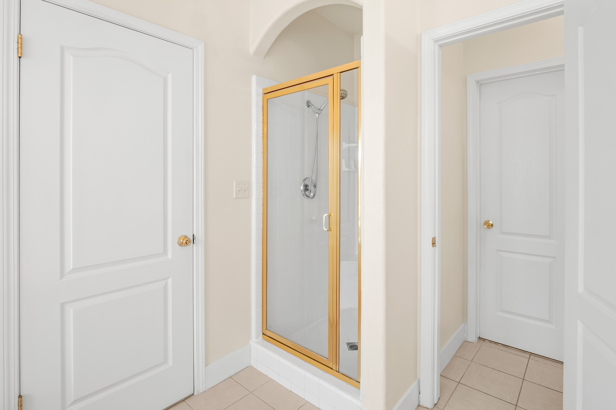 A roomy walk-in shower, and ample counter space. The perfect place to refresh and recharge.