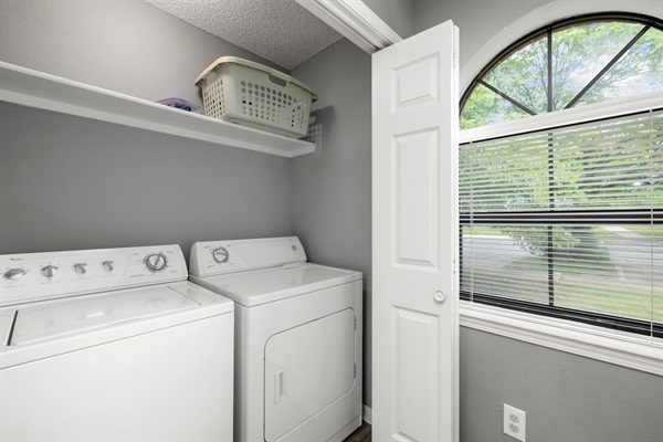 Laundry Room: Efficient appliances and bright natural light for convenience while you unwind!