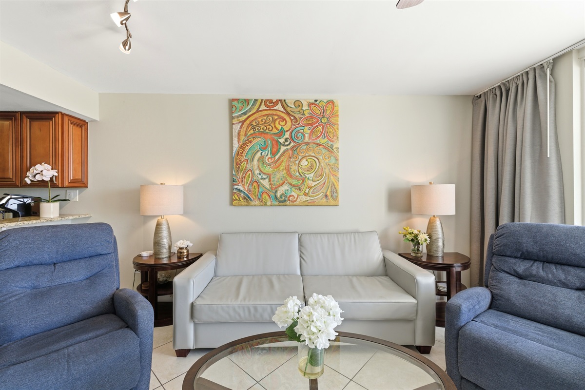 All you need from a living room, comfy recliners, couch....