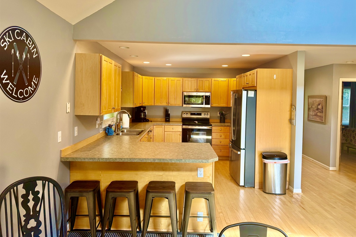 Large well stocked kitchen with upgraded appliances