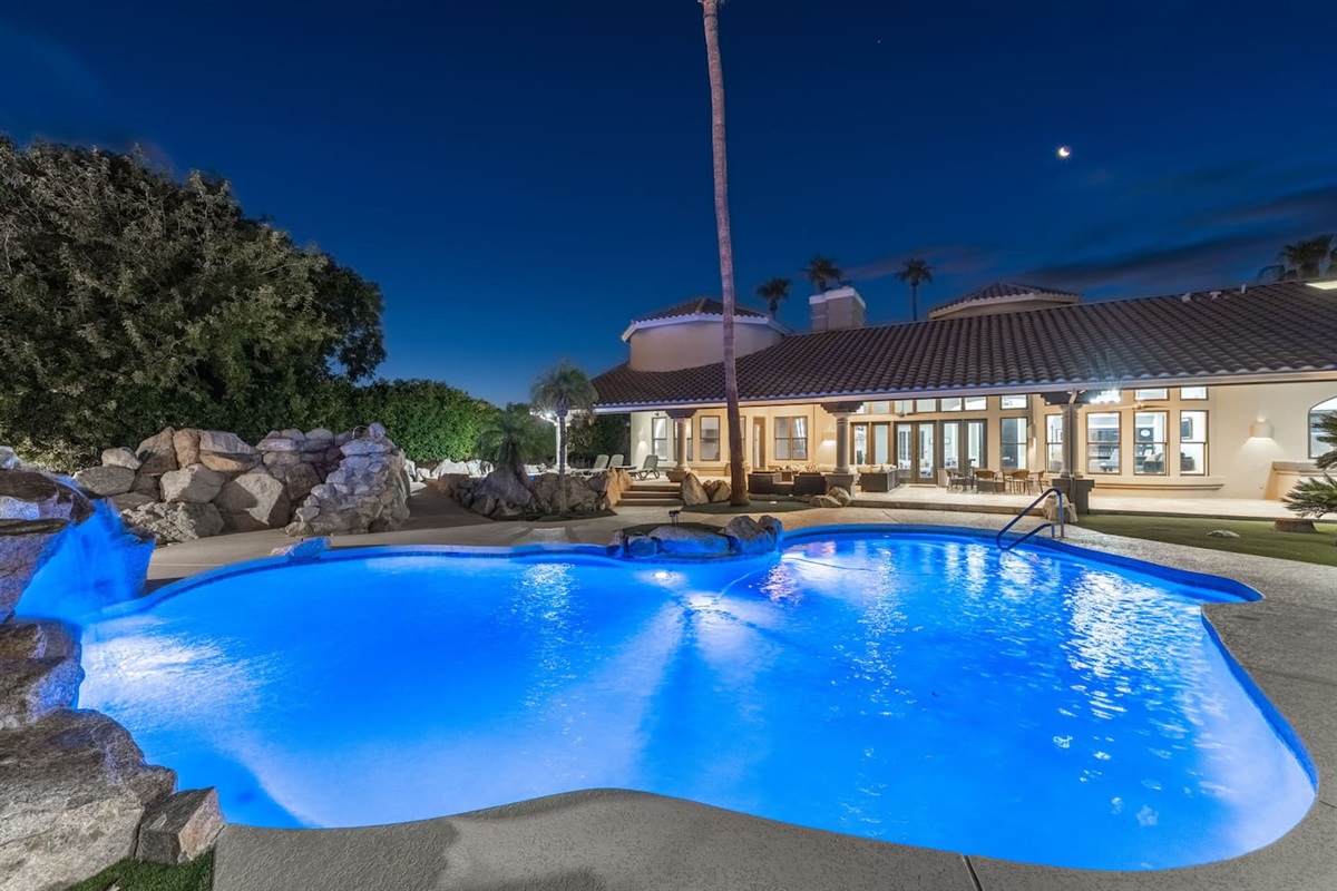 Surround yourself with natural beauty—sparkling pool, stone accents, and a relaxing resort vibe.

