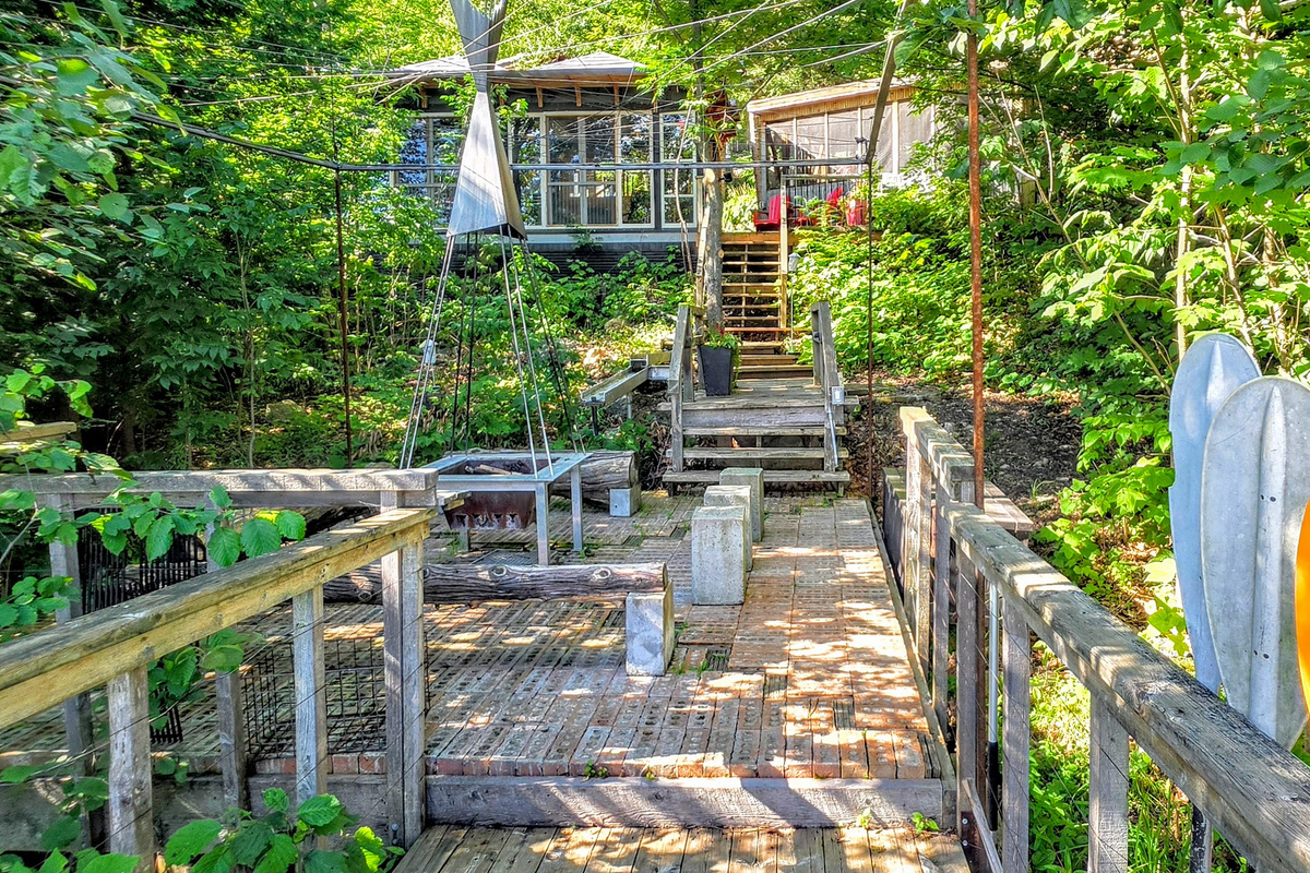 Cottage veranda seen from firepit area