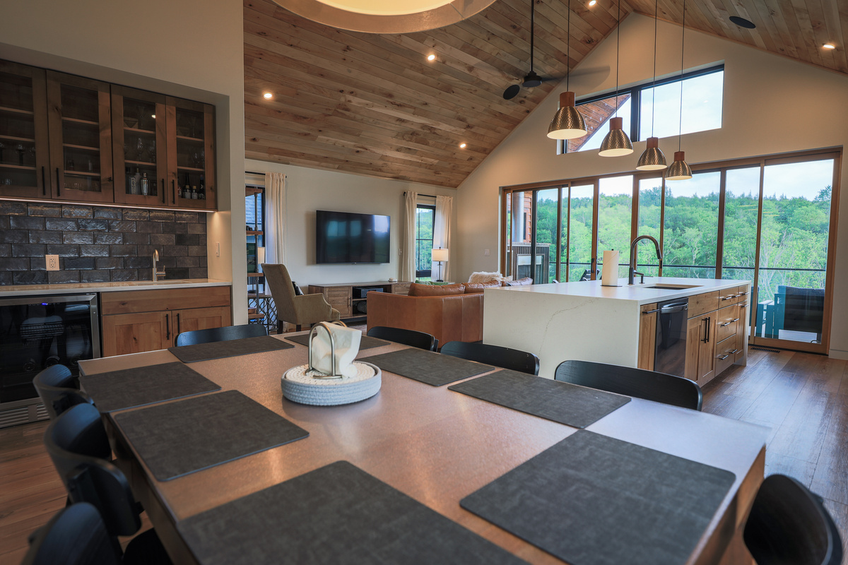 Dining for 8 expands to 10 with leaf. Two extra chairs in Rec Room.