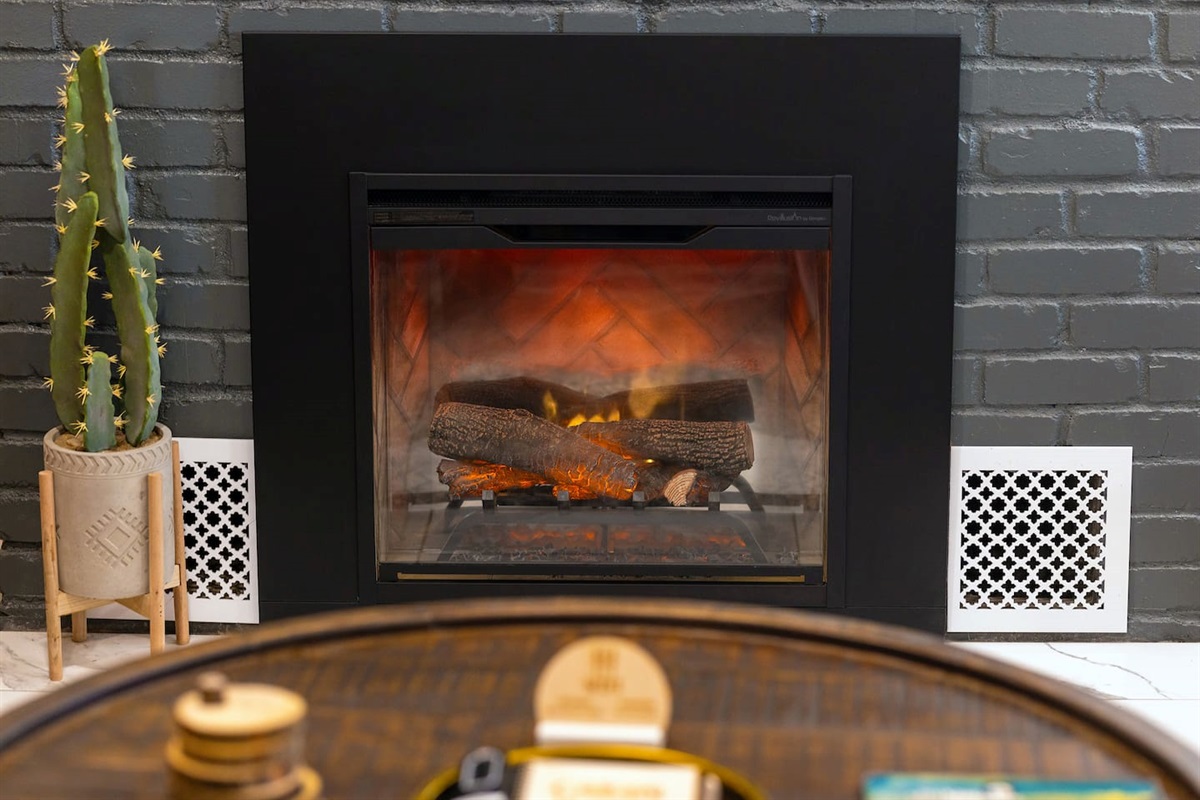 Yes, it's an electronic fireplace. But, it's more for ambience than heat because we do have central heat and air in the home for your year-around comfort.