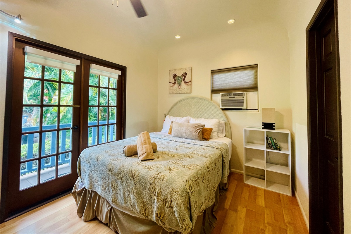 Bedroom 2: queen bed and a crib