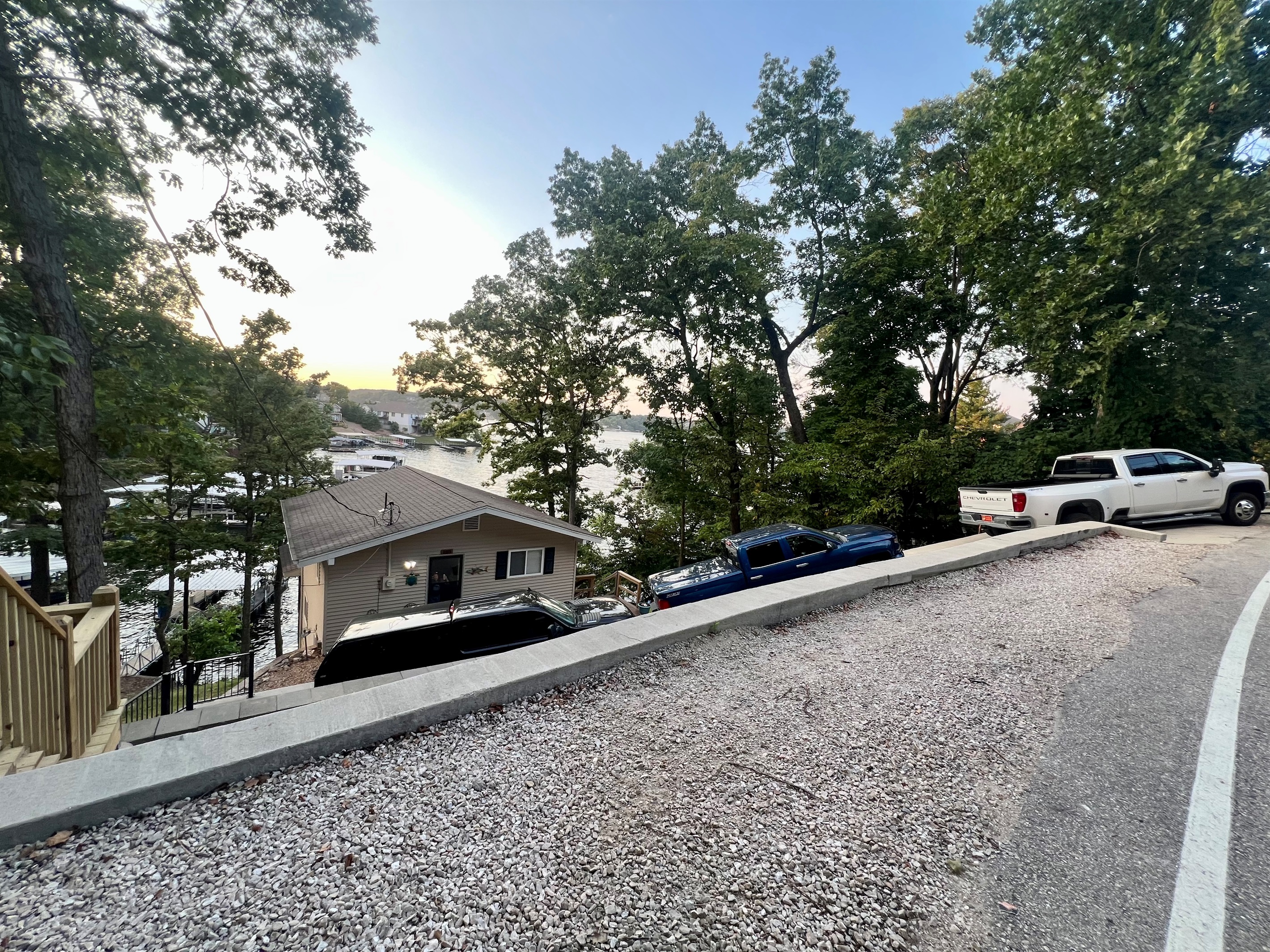 Driveway fits up to 3 full-sized pickup trucks, with extra street parking available