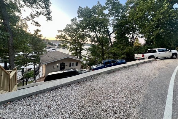 Driveway fits up to 3 full-sized pickup trucks, with extra street parking available