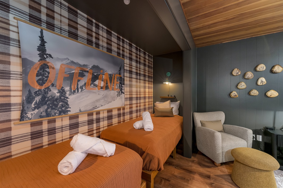 A cozy twin alcove tucked inside the king suite, perfect for kids, teens, or friends who want their own relaxing space within the room.