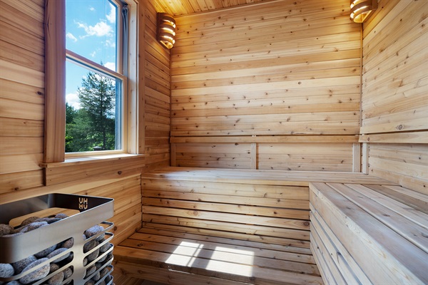 Enjoy a warm, relaxing session in this cedar sauna, perfect after a day of exploring the mountains.