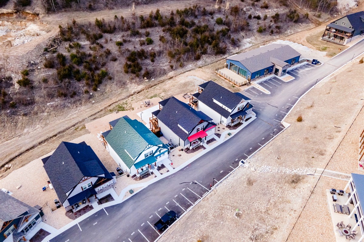 Indoor pool located on the right of this picture. We have 3 neighboring properties available! Game Day is the home with the red metal porch roof.