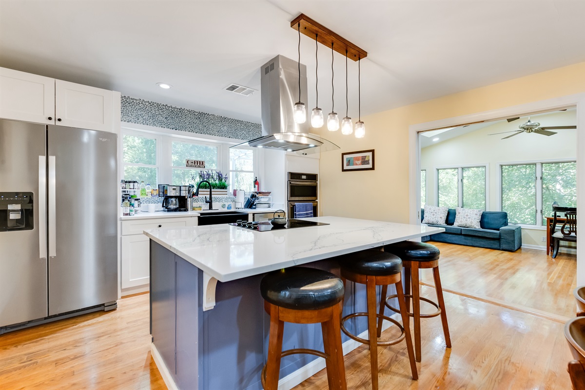 Kitchen: Bright, open space with modern amenities and a view for culinary creativity!