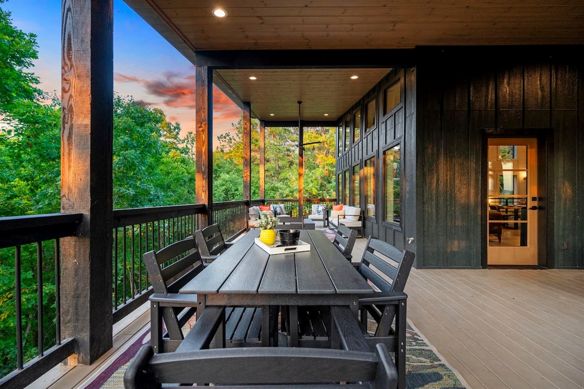 Dine al fresco on the balcony featuring some of the most stunning sunset views in Broken Bow!