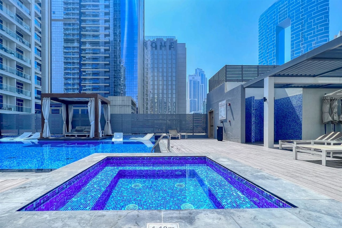 Stunning swimming pool with temperature controlled water, Jacuzzi, sunbeds and cabanas free for guests