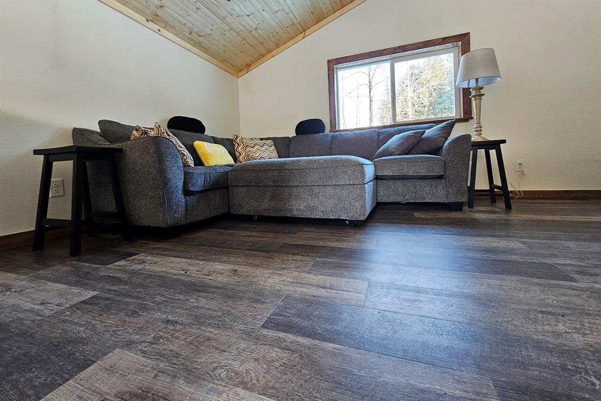 Loft (cabin is still being furnished, living room furniture will vary but each will include a trundle bed, couch, and TV).