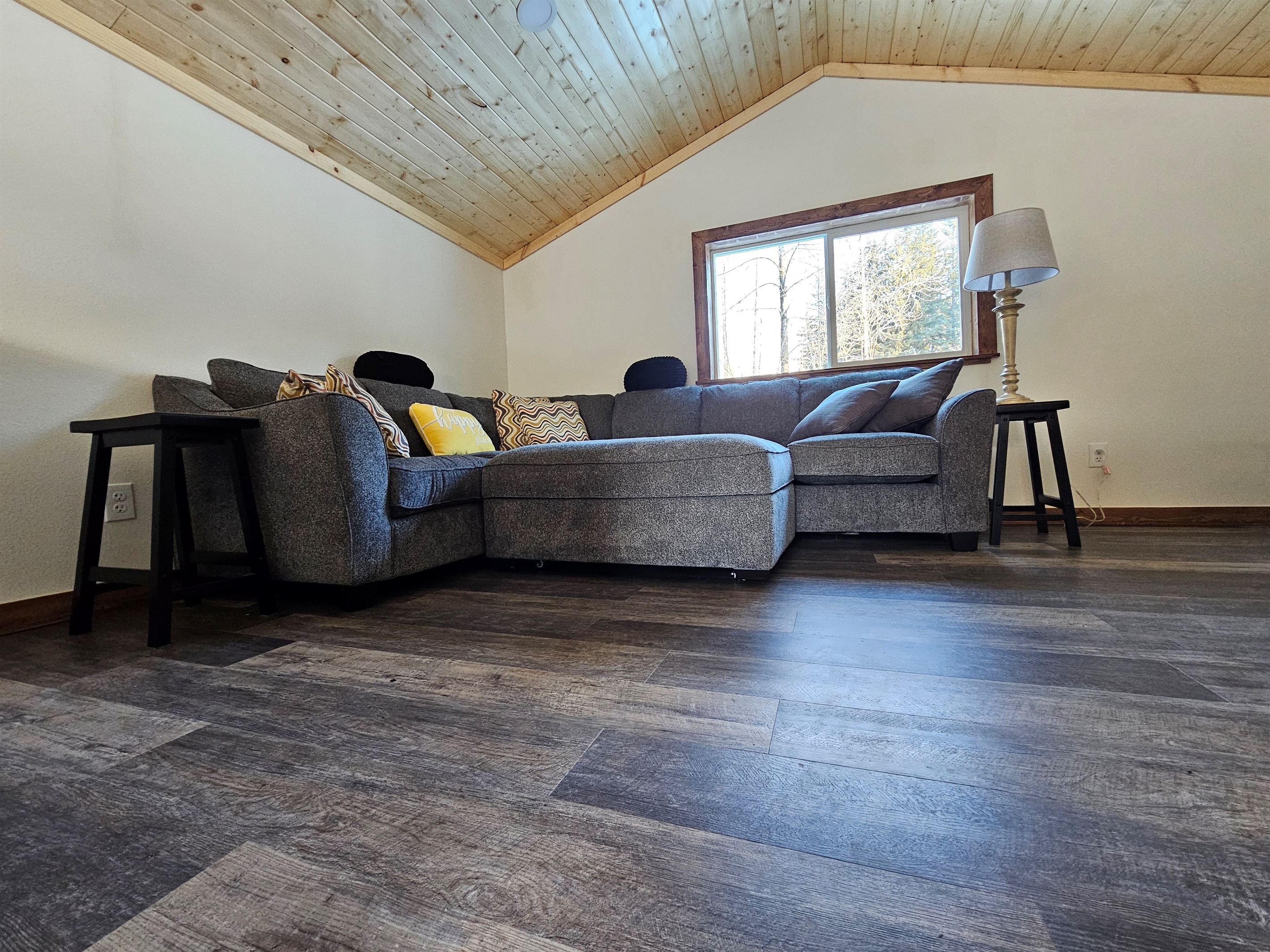 Loft (cabin is still being furnished, living room furniture will vary but each will include a trundle bed, couch, and TV).