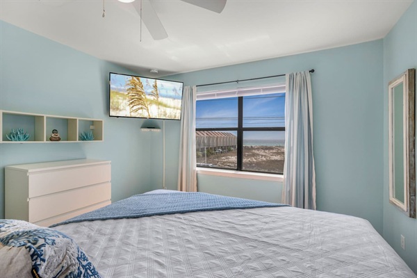 Beautiful water views from the primary bedroom king bed.