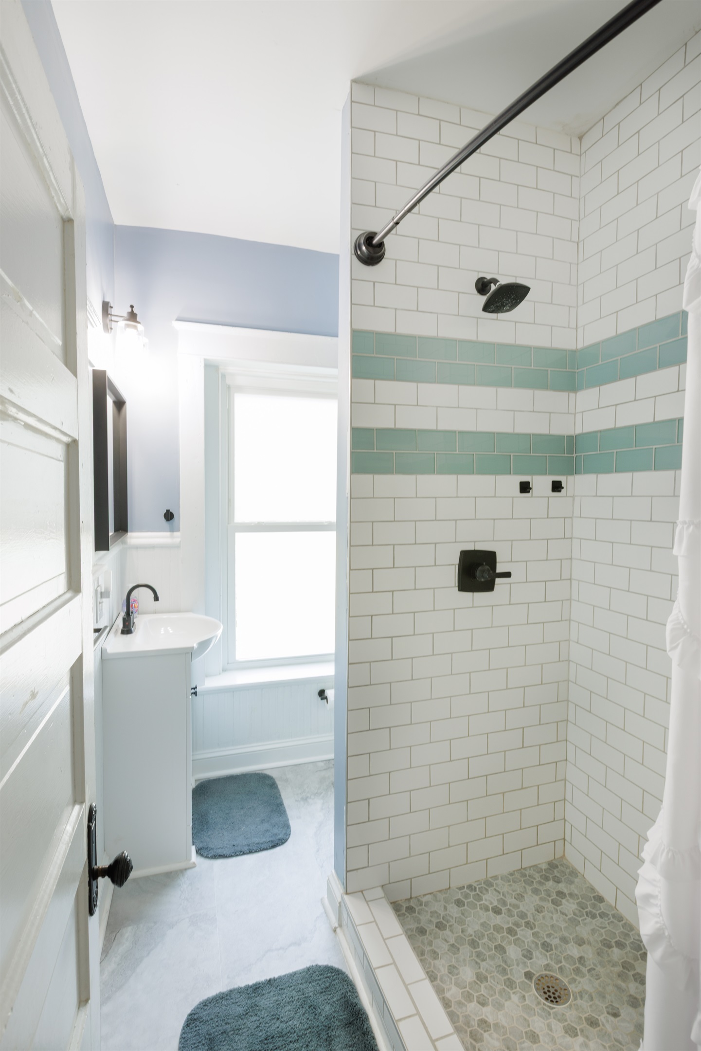 Peaceful and private space with modern fixtures. Full bathroom includes toilet, sink, and shower.