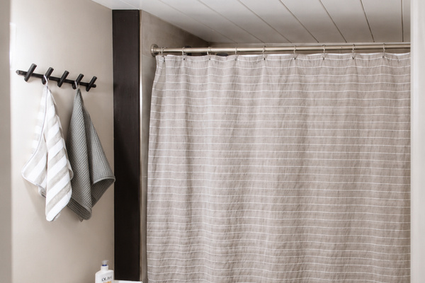Family-friendly bathroom with rain head shower, shampoo, bath toys, baby potty, and extra add ones to delight both the young and young-at-heart.