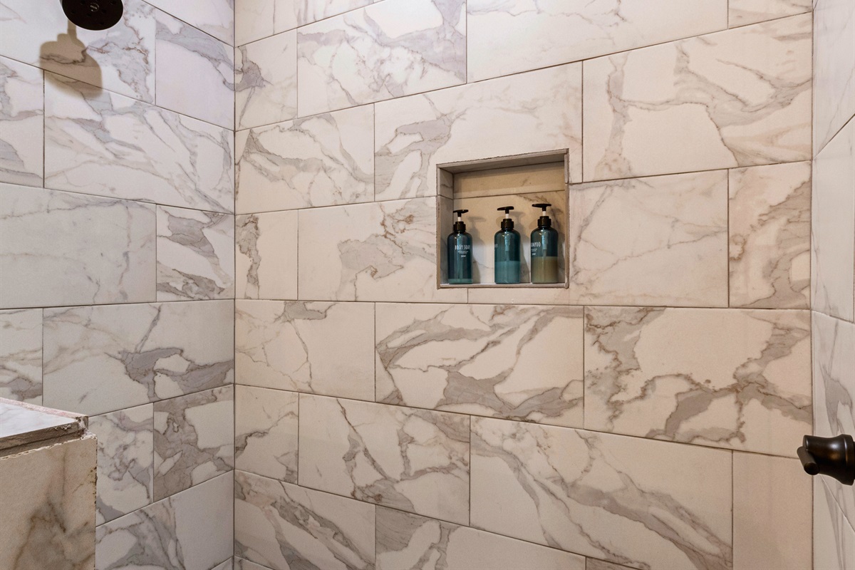 Wash away your worries in our spacious walk-in shower—your daily dose of relaxation