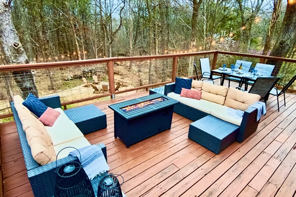 800 sf Deck | Fire Table | Outdoor Cooler | Gas Grill (Propane Provided) | Private Hot Tub | Outdoor Games | Private Wooded Views | String Lights | Outdoor Dining Table for 6