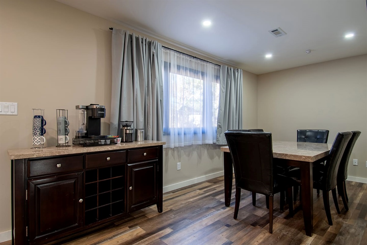 Beverage station and seating for 6 people.