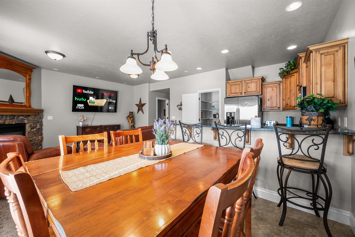 A perfect spot for shared meals, game nights, and lasting memories. Additional seating for 3 at the kitchen bar.