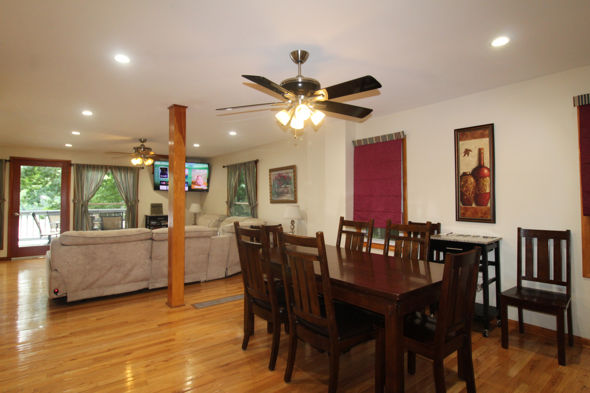 Open floor plan on main floor with a large flat screen Roku TV.  