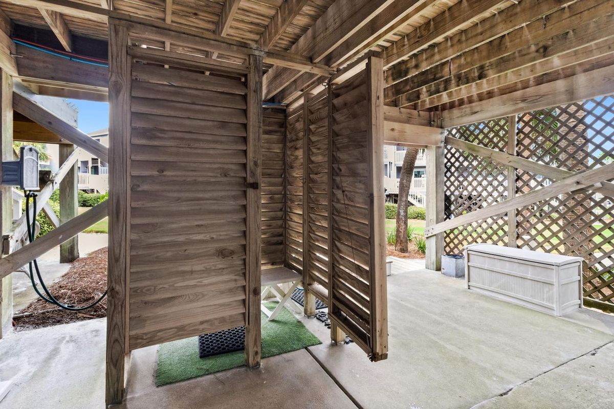 Soak off the sand at the enclosed outdoor shower before you step inside &mdash; no sandy floors, ever.