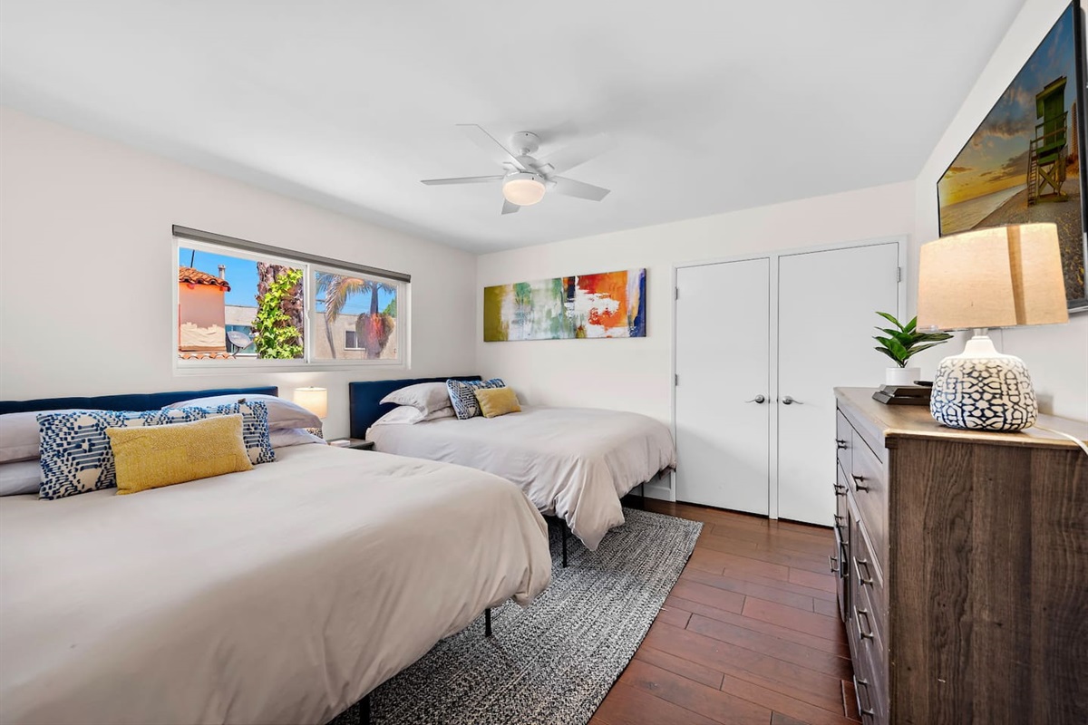 Our 2nd bedroom contains two queen beds with premium mattresses, a 55"smart TV with Disney Plus, Netflix and Amazon Prime as well as a PlayStation 4 for "down time."