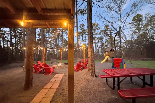 Magic happens when the bistro lights glow - your enchanted forest retreat awaits.