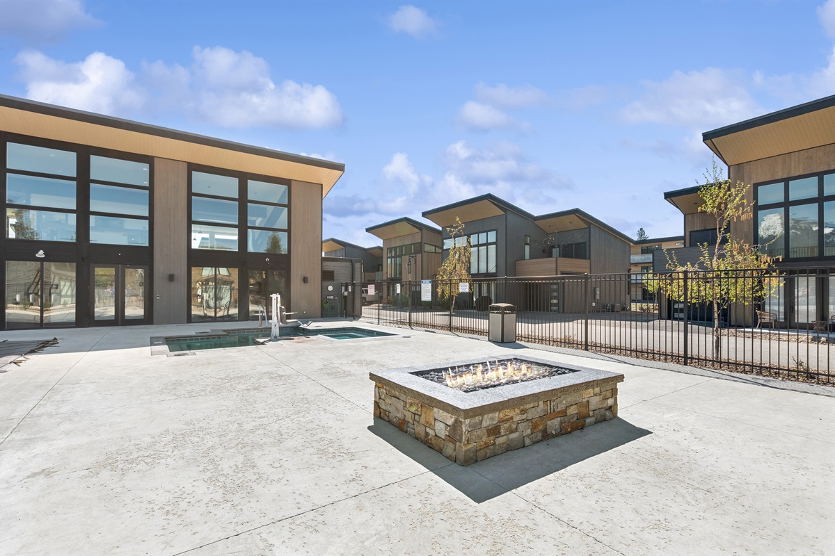 Lounge by the community fireplace after a day of adventure!