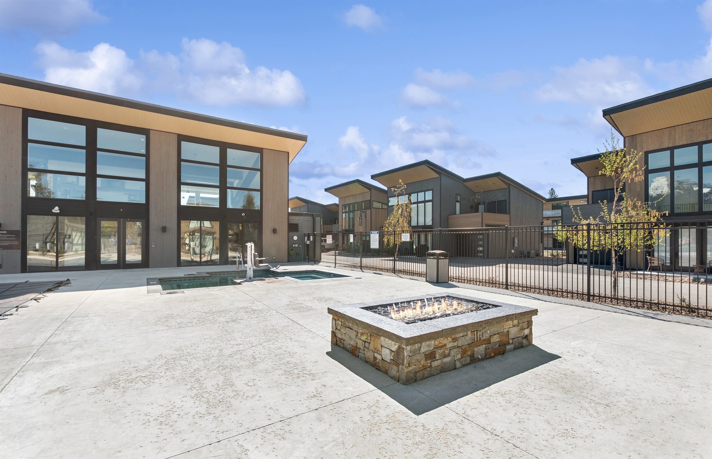 Lounge by the community fireplace after a day of adventure!