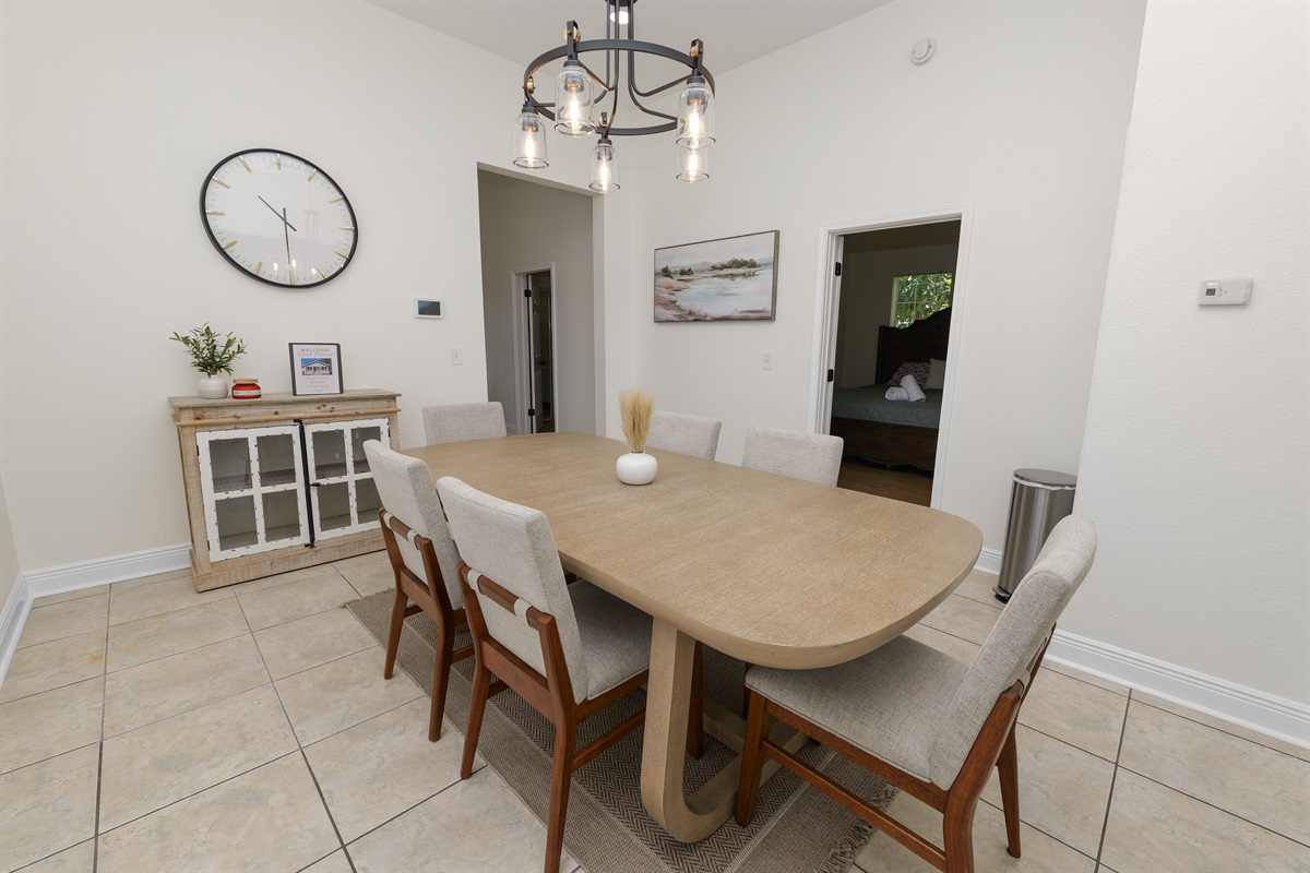 A warm, inviting dining space featuring plush seating and modern farmhouse touches for a homey feel.