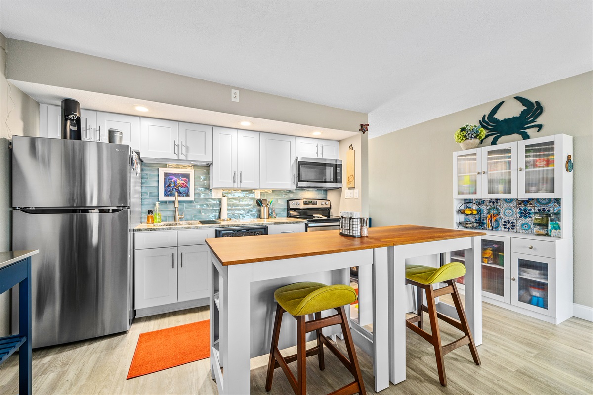 Dining Area and Stainless Steel Kitchen