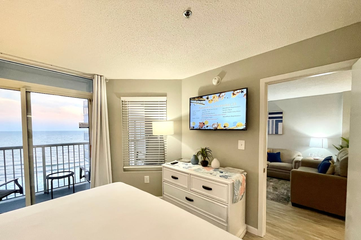 Master Bedroom with Balcony Access and Private Bathroom 