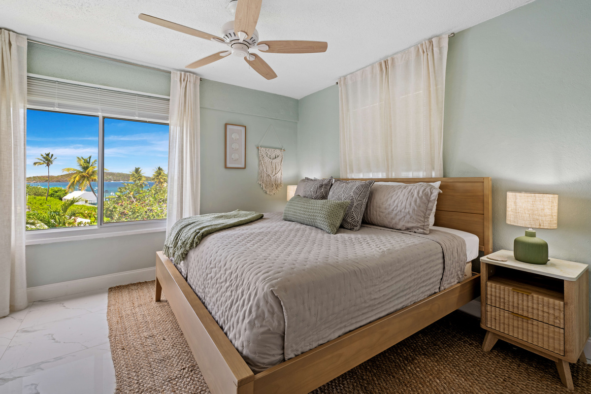 Retreat to the spacious primary suite after a day of island adventures.