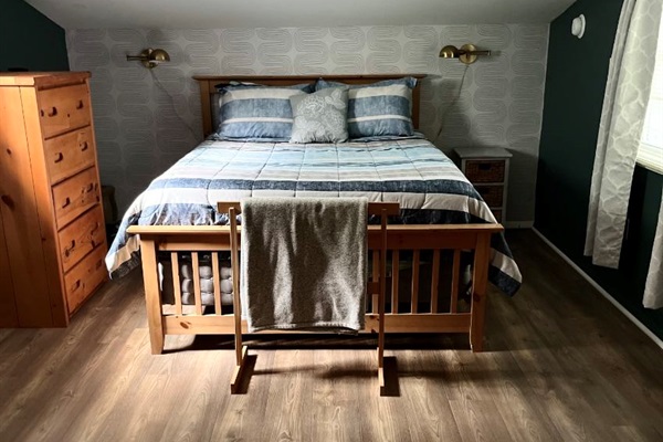 Loft bedroom with a queen bed.
