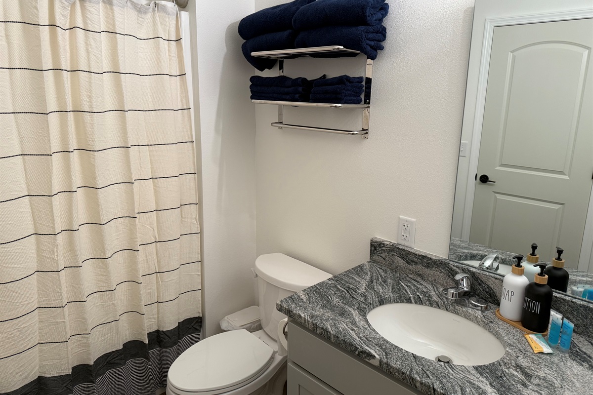 Bathroom number 2 has tub shower combination 
