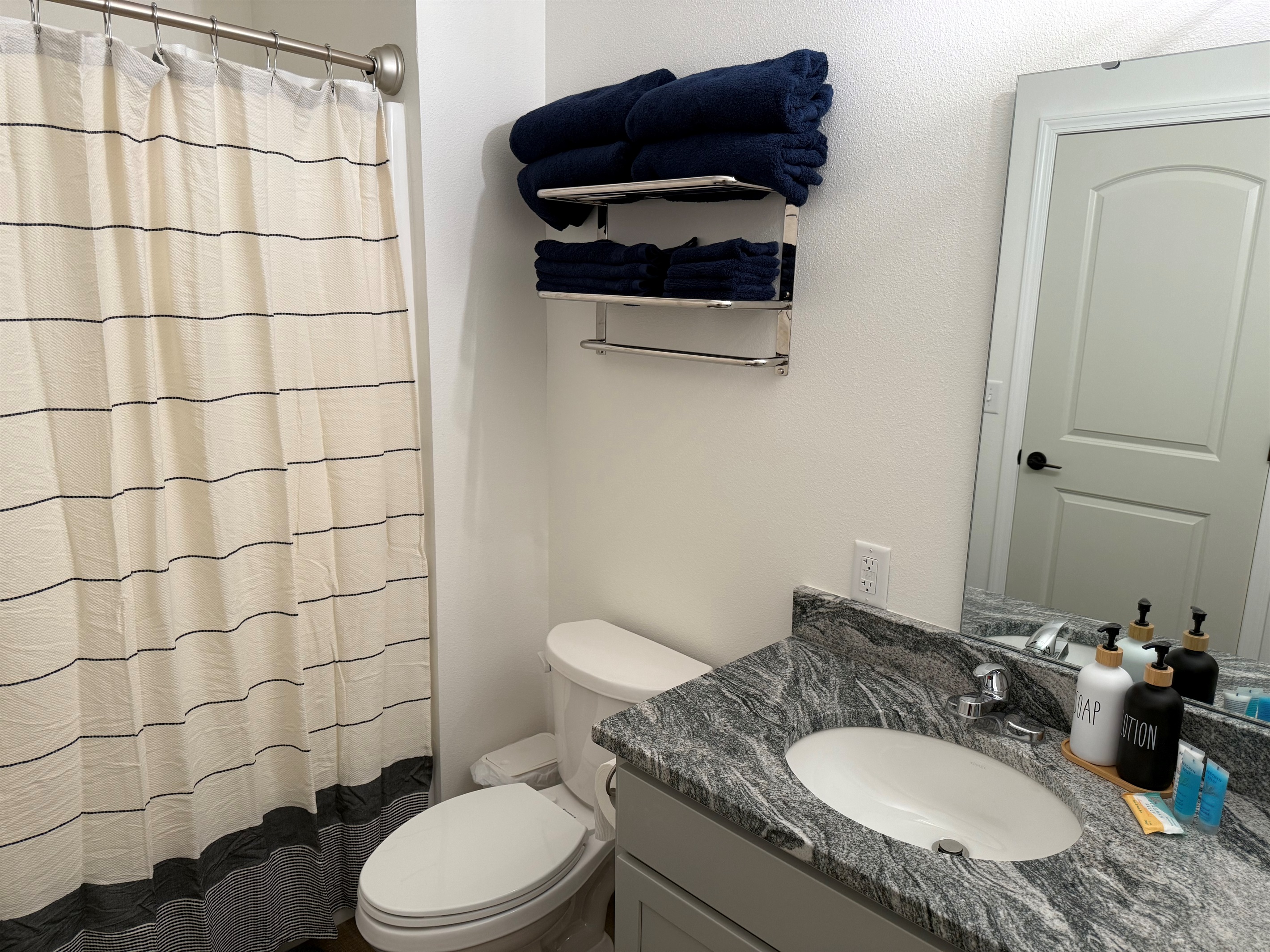 Bathroom number 2 has tub shower combination 