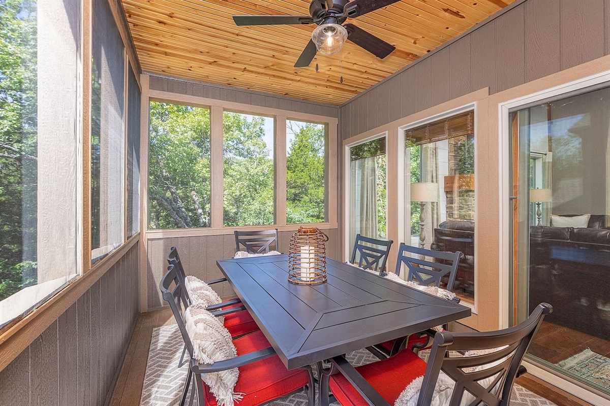 Main Level Screened in Deck overlooks nature trail and creek